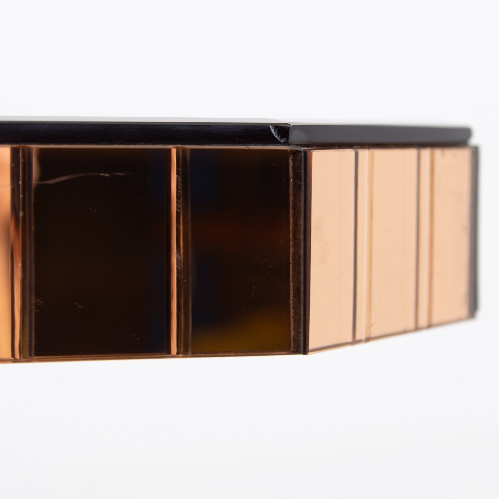 A pair of 1930s Art Deco side tables featuring peach-tinted mirrored tops, inverted pyramidal pedestal bases, and stepped square foundations. View III