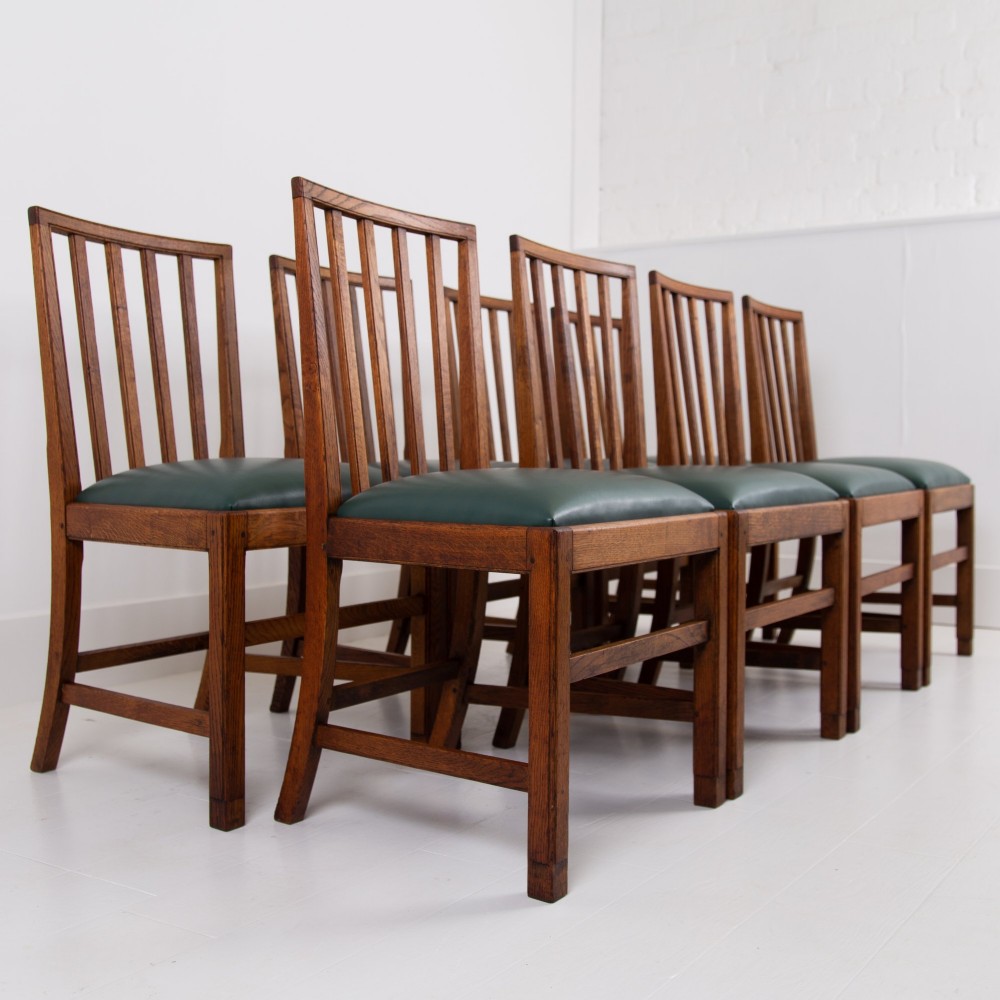 Set of 8 Gordon Russell Arts & Crafts Golden Oak Chairs 1930s