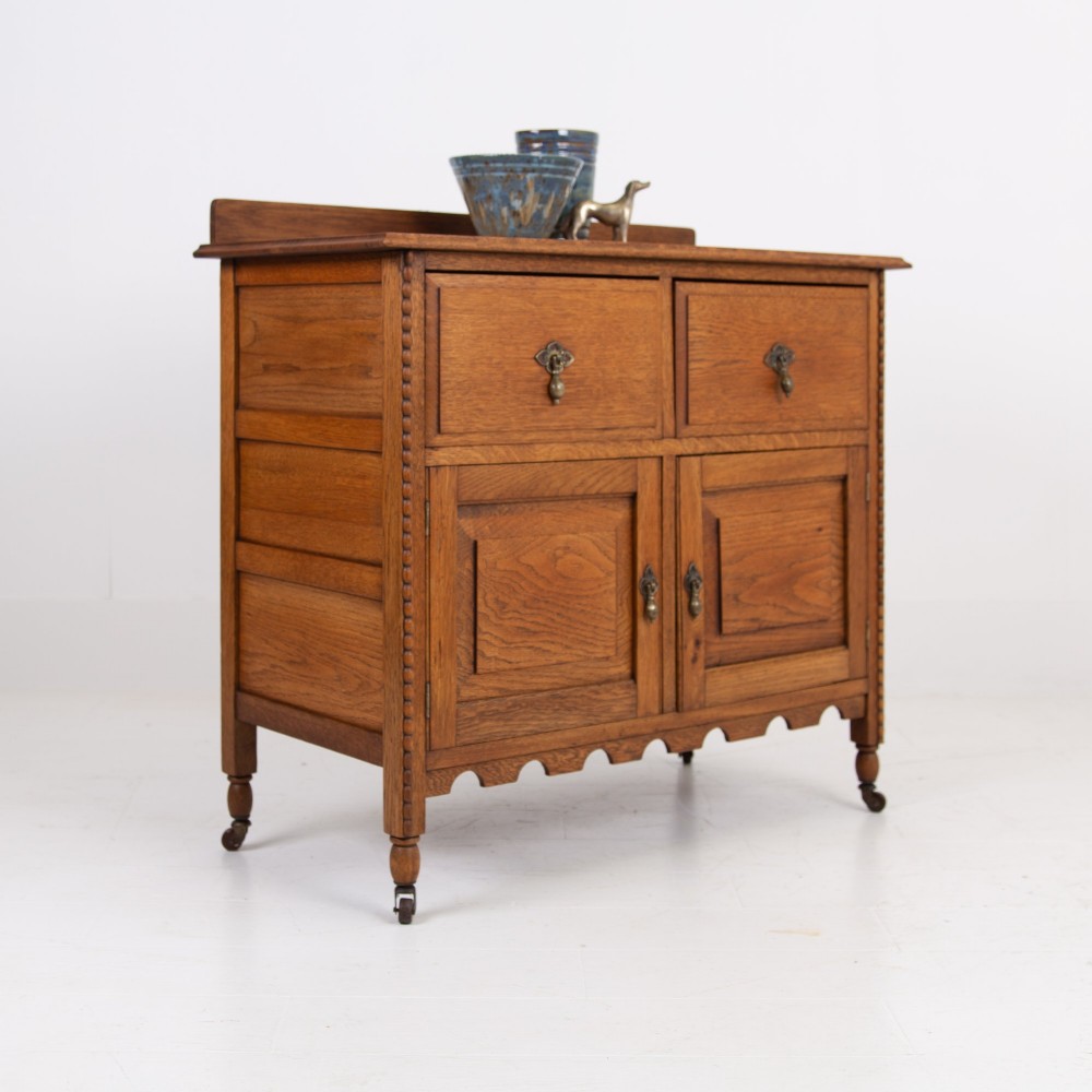 A Charming Oak Cabinet With Drawers C1910