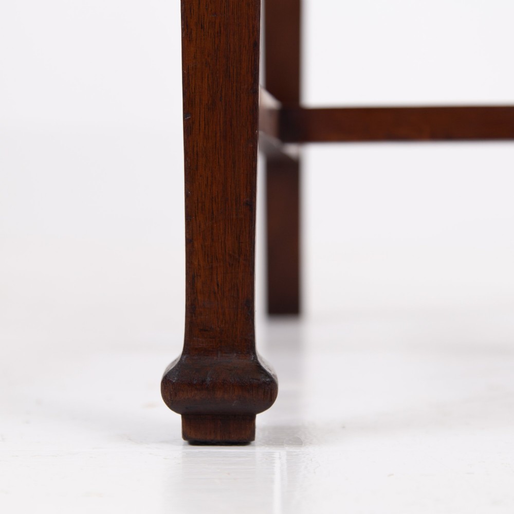 A set of six Scottish Arts and Crafts oak dining chairs featuring high slatted backs with carved roundel details and red velvet seat pads. View XI