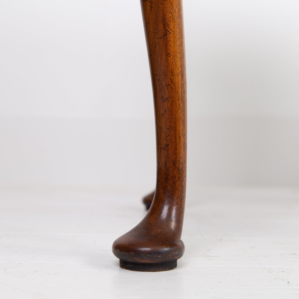 An antique warm brown walnut lowboy table featuring three drawers with brass handles, a shaped apron, and four cabriole legs ending in pad feet. View VI