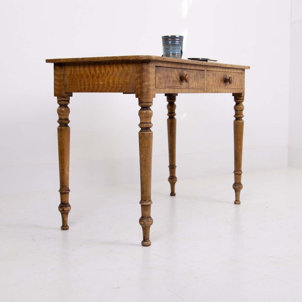 A 19th-century pine side table featuring two drawers with wooden knob handles, supported by slender turned legs. View XIII