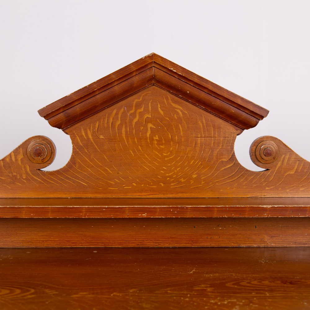A Victorian scumble-painted pine kitchen dresser with three drawers, a cupboard door, turned knobs, and a galleried splashback shelf. View II