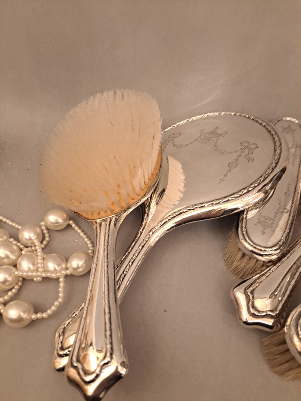 Silver dressing table set. Walker and Hall View X