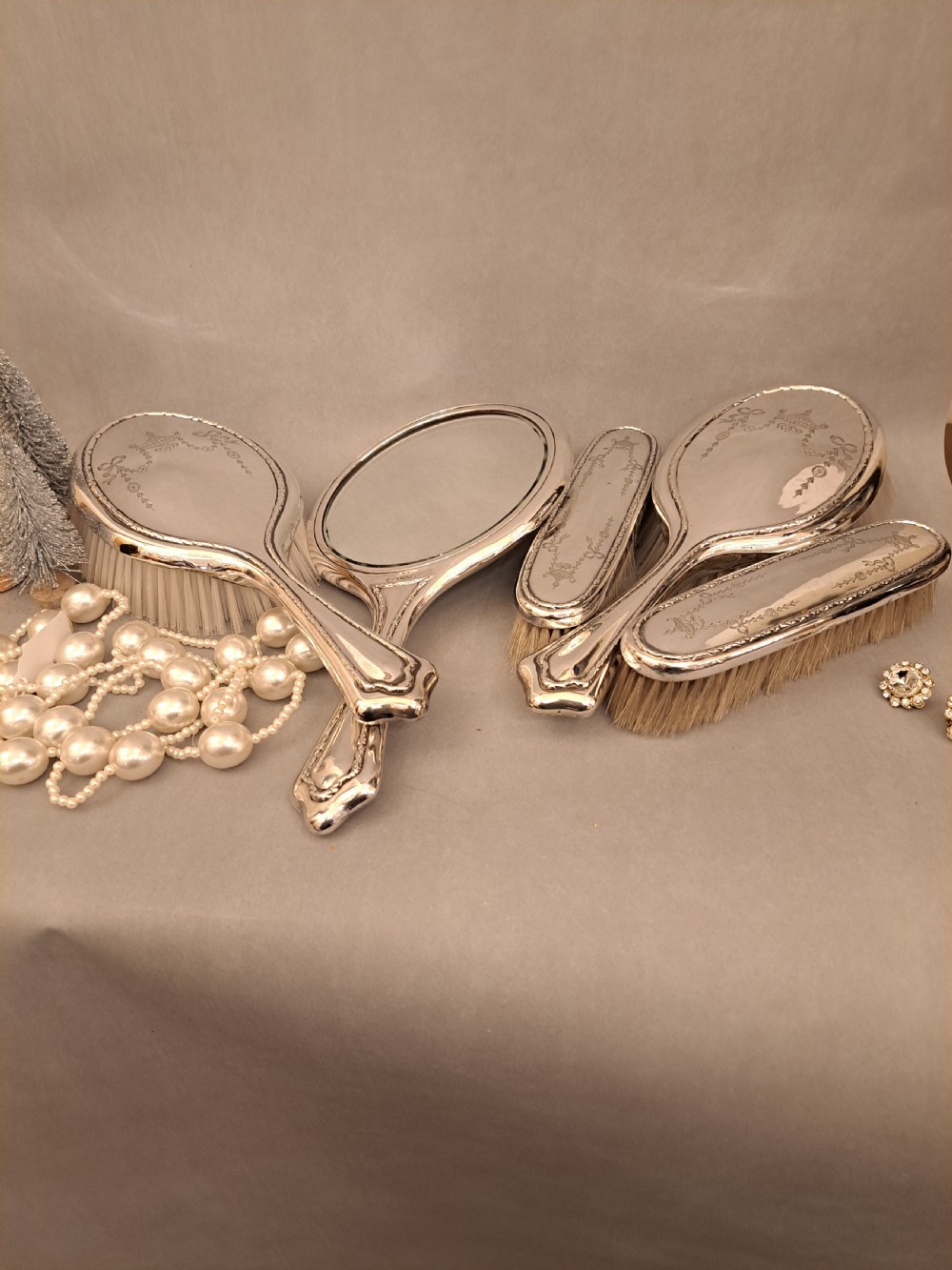 Silver dressing table set. Walker and Hall View XIV