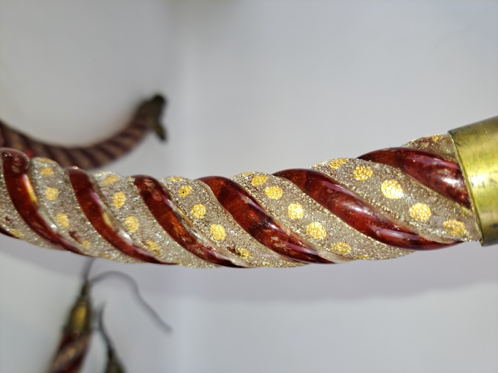 A set of four curved Bohemian ruby glass chandelier arms featuring twisted spiral patterns highlighted with gold enamelled dots and brass threaded mounts. View II