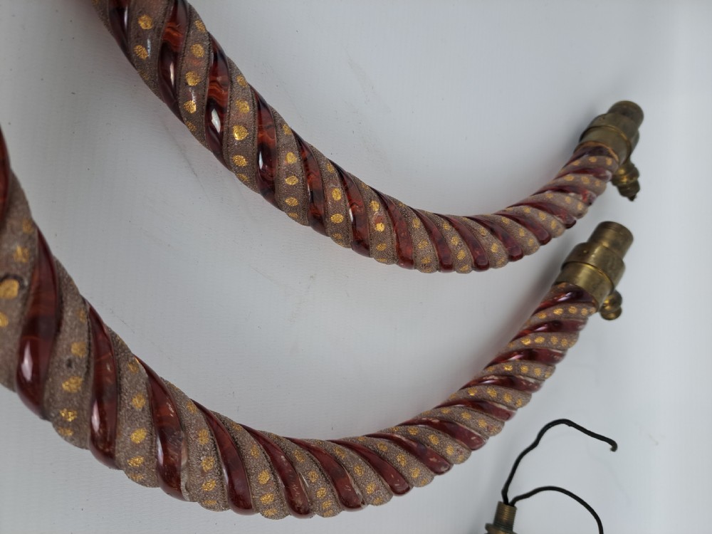 A set of four curved Bohemian ruby glass chandelier arms featuring twisted spiral patterns highlighted with gold enamelled dots and brass threaded mounts. View VII