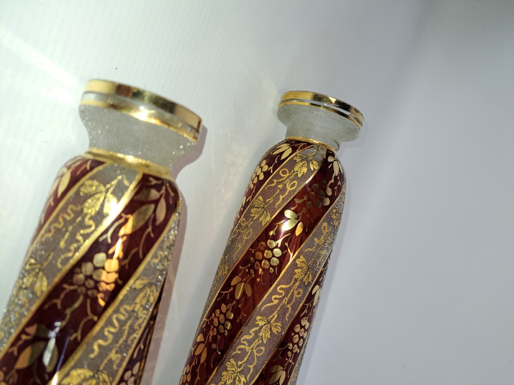 A pair of antique ruby red and frosted glass chandelier stems decorated with spiral gilt grapevine patterns. View IV