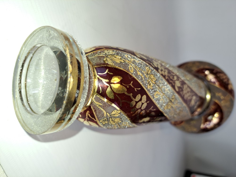 A pair of antique ruby red and frosted glass chandelier stems decorated with spiral gilt grapevine patterns. View VI