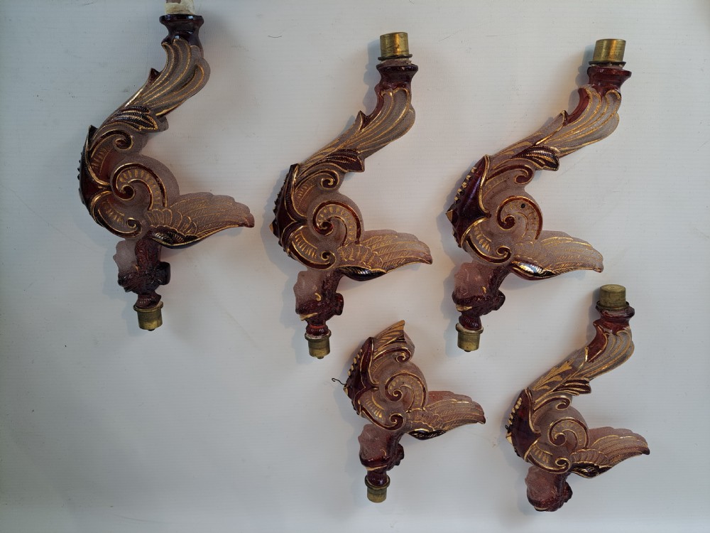 Set of five 19th-century Bohemian ruby and frosted glass chandelier arms shaped like winged forms with gilded scroll accents.