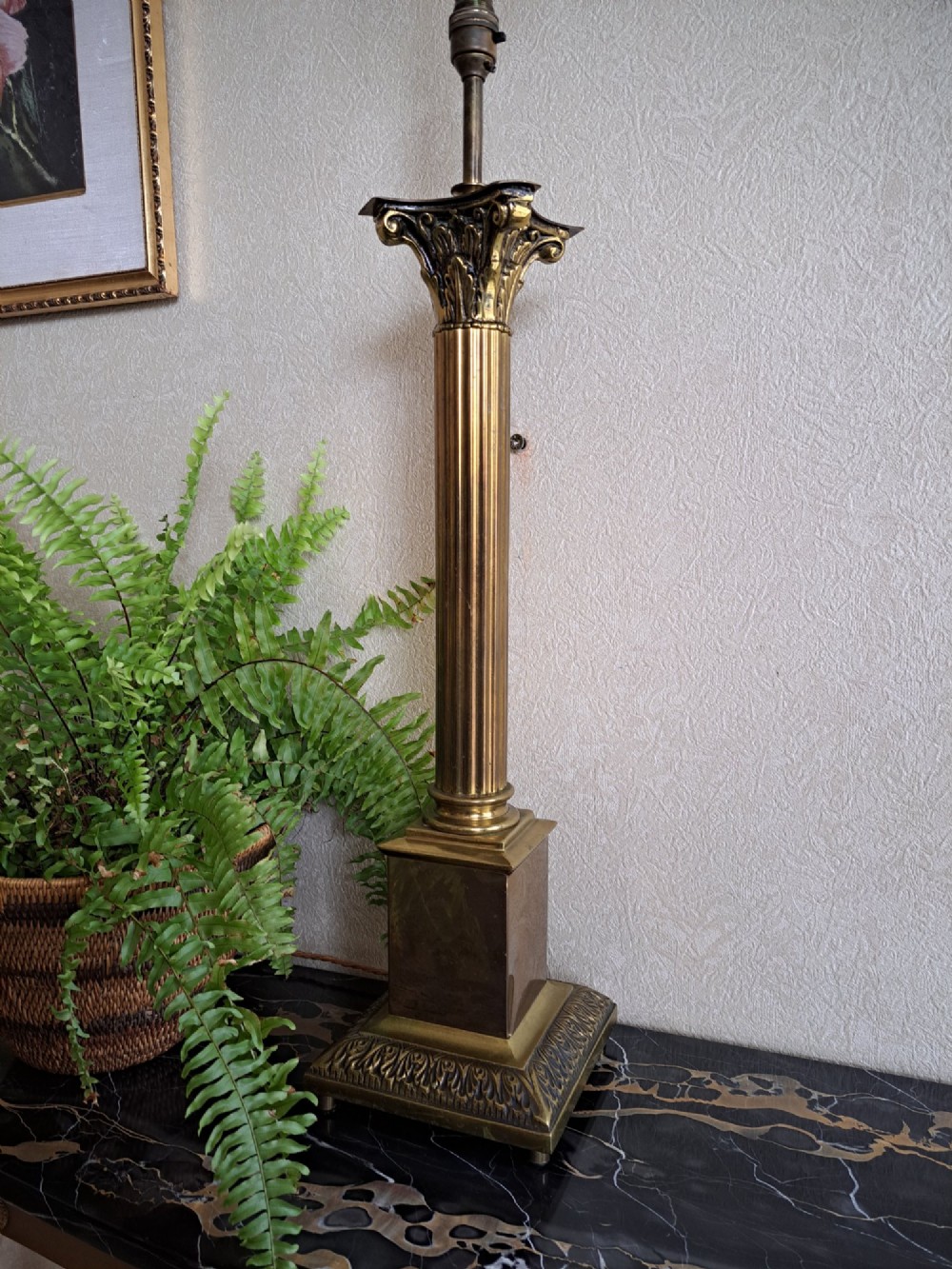 A brass table lamp designed as a classical Corinthian column with a fluted shaft and stepped square base. View XI