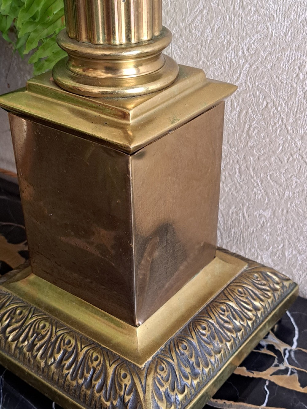 A brass table lamp designed as a classical Corinthian column with a fluted shaft and stepped square base. View XIII