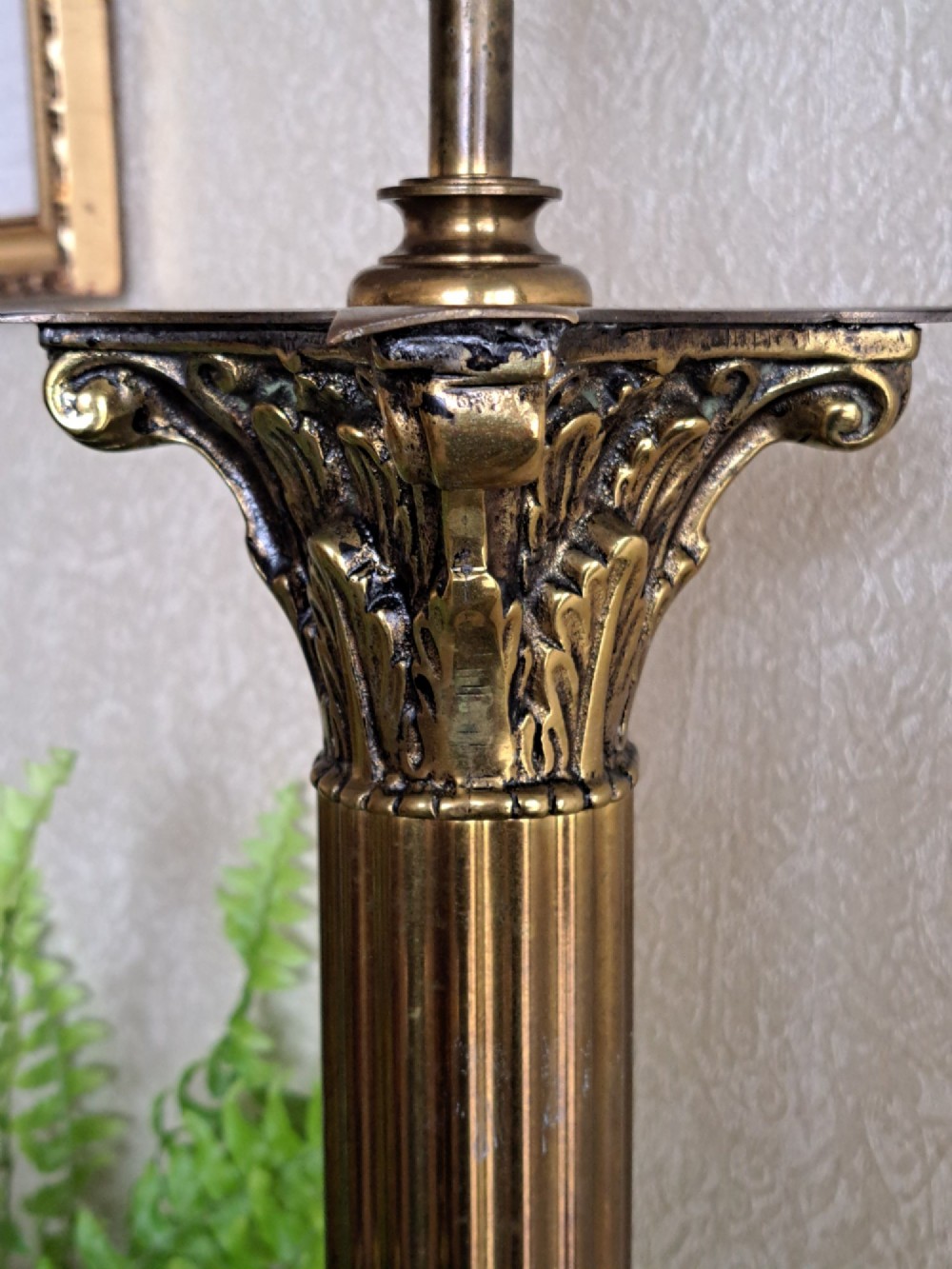 A brass table lamp designed as a classical Corinthian column with a fluted shaft and stepped square base. View XIV