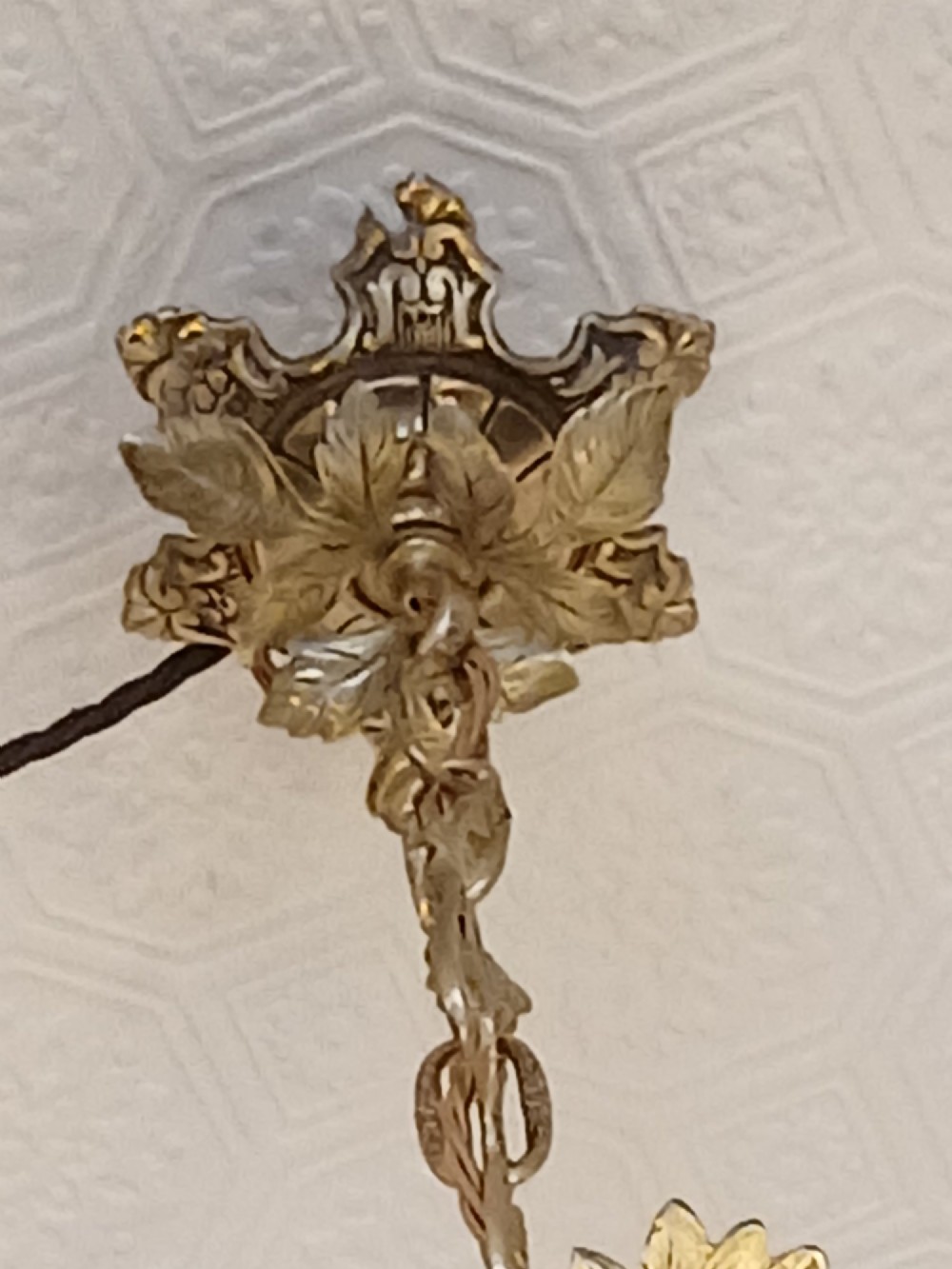 A French gilt bronze chandelier featuring leaf and floral motifs arranged in a basket form with candle bulb sockets. View VIII