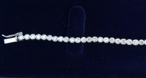 fig 1. Fabulous art deco platinum 4.78ct diamond graduated vintage antique tennis bracelet