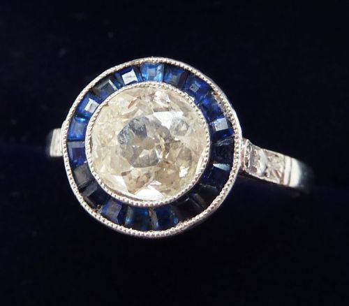 fig 1. Stunning art deco platinum 1.25ct diamond and sapphire target vintage antique ring