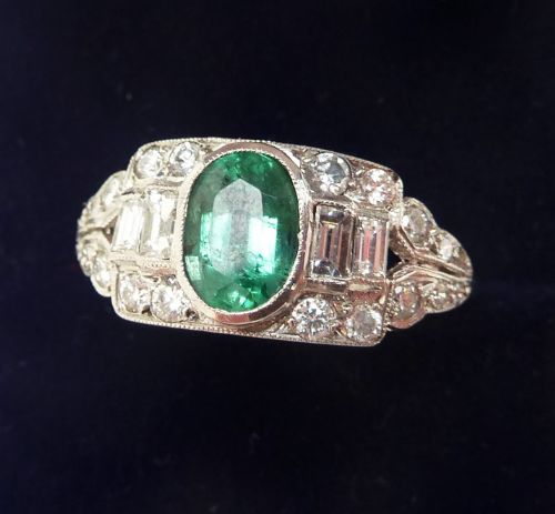 fig 1. Stunning platinum 0.90ct emerald and 0.73ct diamond vintage antique cluster ring
