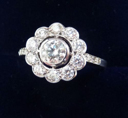 fig 1. Gorgeous art deco platinum 0.91ct diamond vintage antique daisy ring
