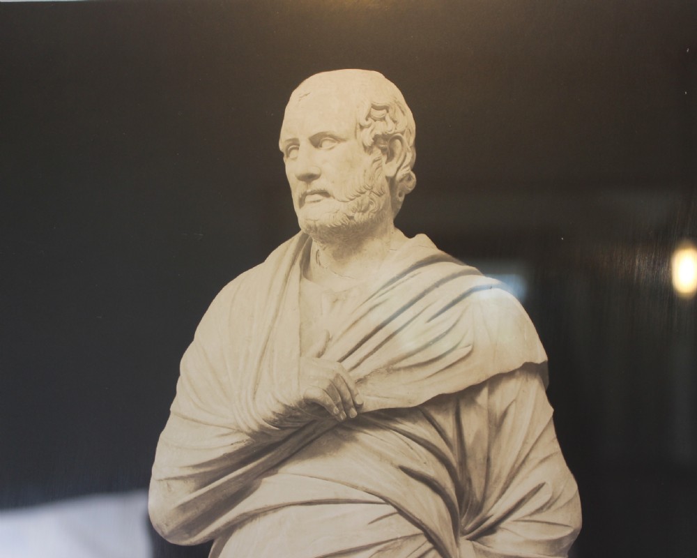 A pair of black and white framed photographic prints depicting ancient classical statues from the Naples National Archaeological Museum in dark stepped frames with gold accents. View III