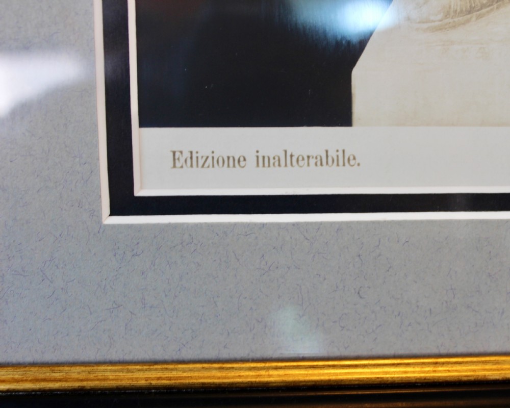 A pair of black and white framed photographic prints depicting ancient classical statues from the Naples National Archaeological Museum in dark stepped frames with gold accents. View IV