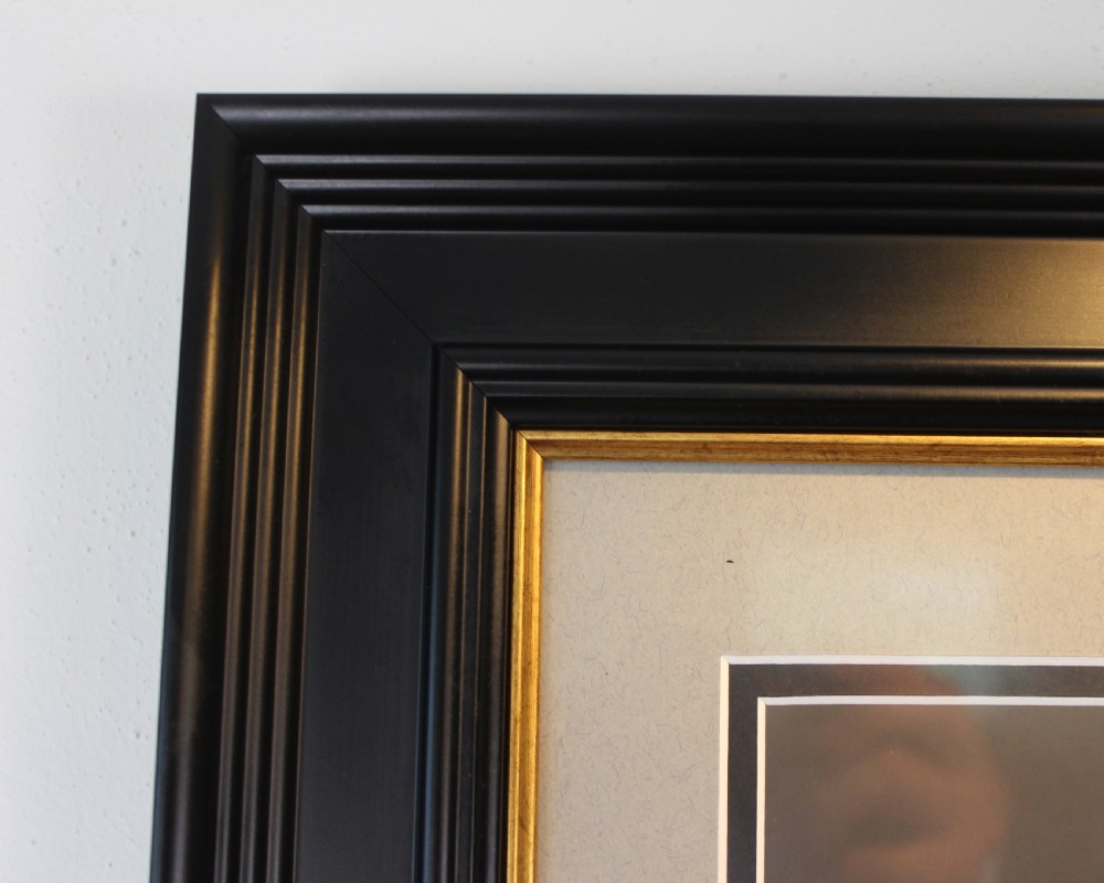 A pair of black and white framed photographic prints depicting ancient classical statues from the Naples National Archaeological Museum in dark stepped frames with gold accents. View XIII