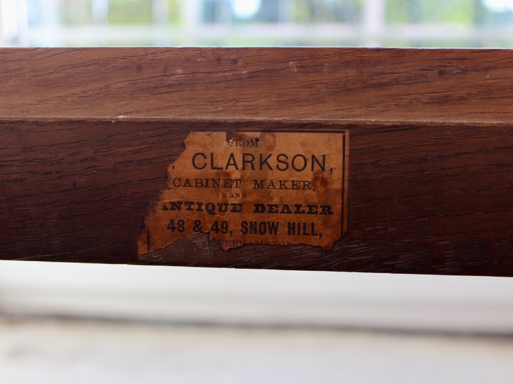 A set of eight George III oak country dining chairs with pierced splat backs and woven rush seats. View VIII