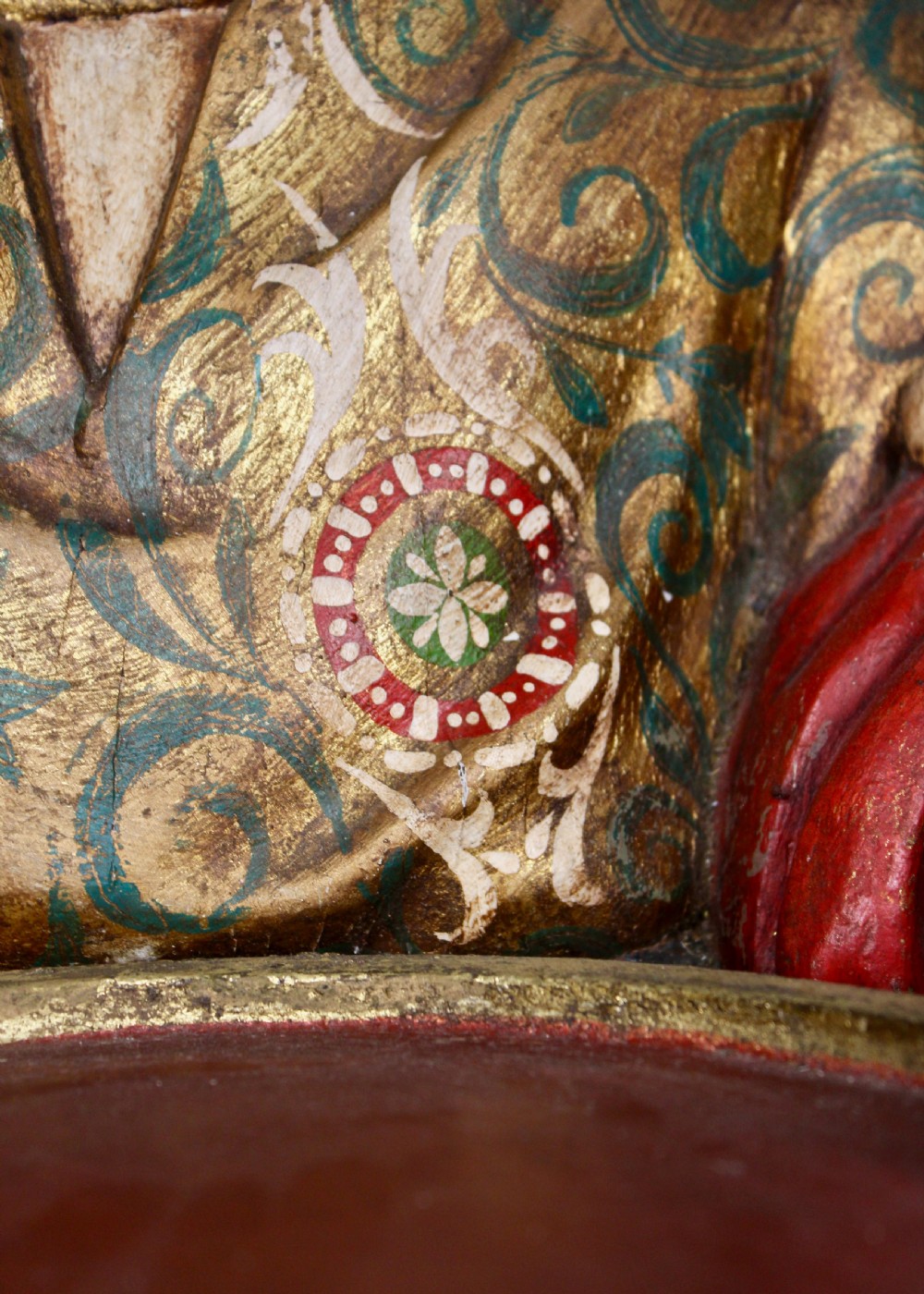 A carved wooden standing Venetian waiter figure wearing a decorated gold tunic and turban while holding a tray on a carved base. View V