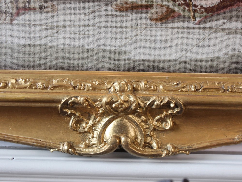 A large Victorian gilt-framed Berlin woolwork picture depicting a detailed biblical scene of Pharaohs dream with embroidered figures. View IX