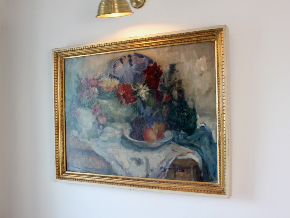An impressionist still life oil painting on canvas depicting flowers and fruit in ceramic vessels, set within a beaded gilt wooden frame. View VI