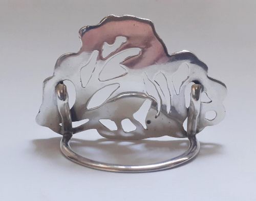 fig 1. A pair of Victorian pierced sterling silver menu card holders featuring detailed bird and botanical foliage designs.