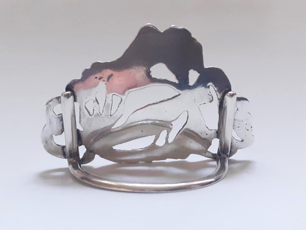 A pair of Victorian pierced sterling silver menu card holders featuring detailed bird and botanical foliage designs. View III