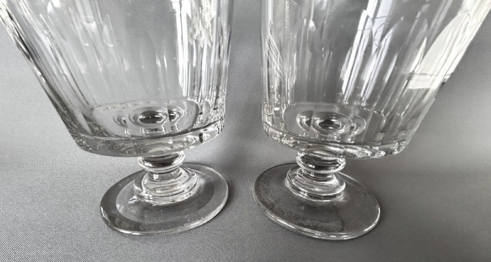 A pair of clear glass Georgian rummers featuring cut fluted bowls, knopped stems, and flat circular bases. View III