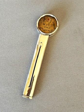 An Edwardian sterling silver mechanical pencil featuring a circular rotating trump marker dial at the top. View III