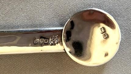 An Edwardian sterling silver mechanical pencil featuring a circular rotating trump marker dial at the top. View IV