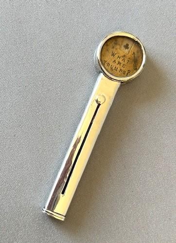 An Edwardian sterling silver mechanical pencil featuring a circular rotating trump marker dial at the top. View VII