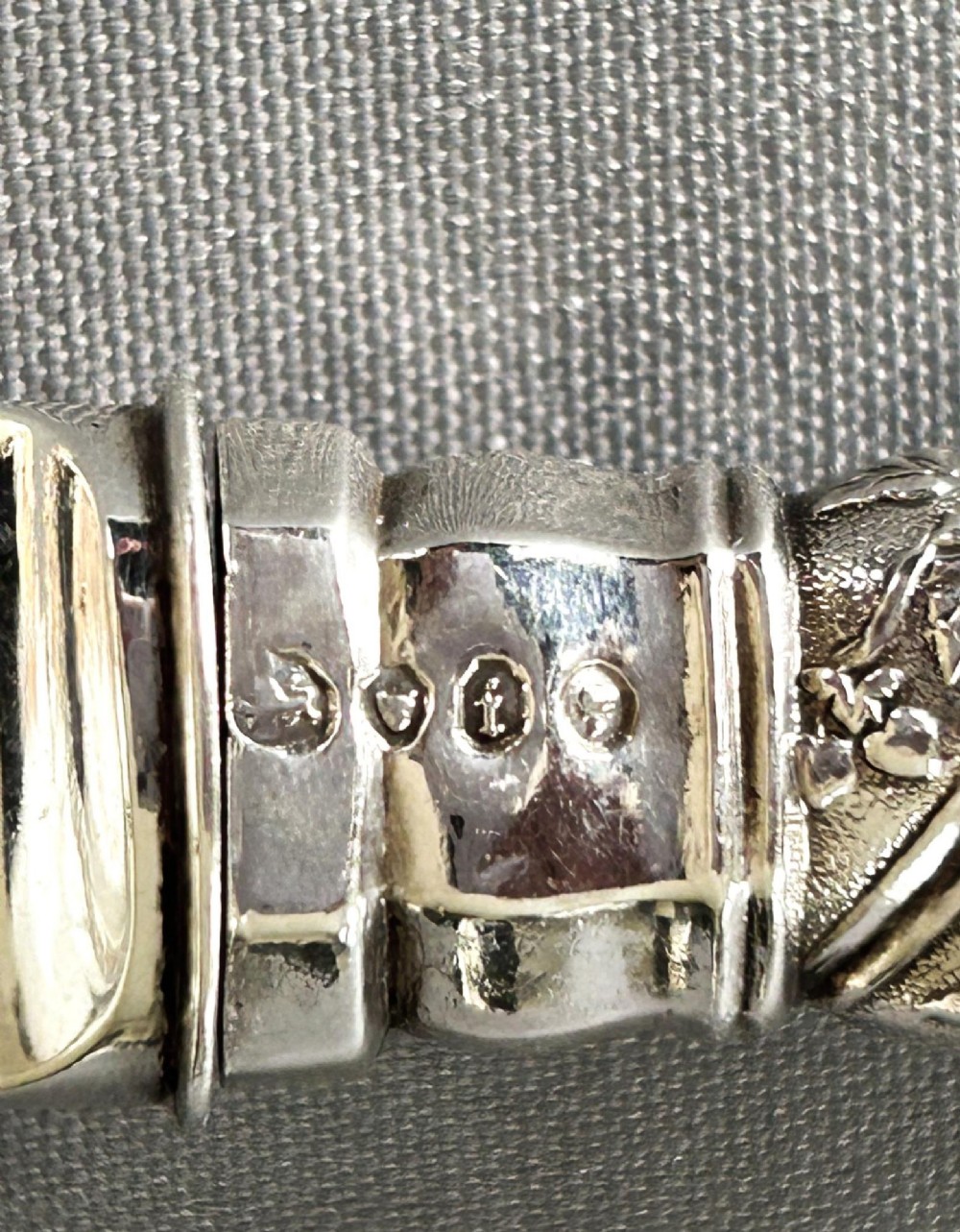 A Victorian silver fish serving knife featuring an engraved river landscape scene on the blade and a chased spiral twist handle. View II