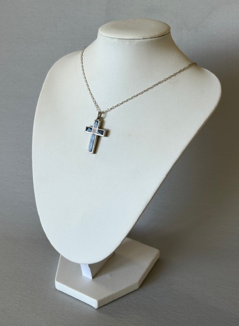 A Victorian silver cross pendant inlaid with grey and black striped Montrose agate panels, suspended on a fine silver link chain. View V