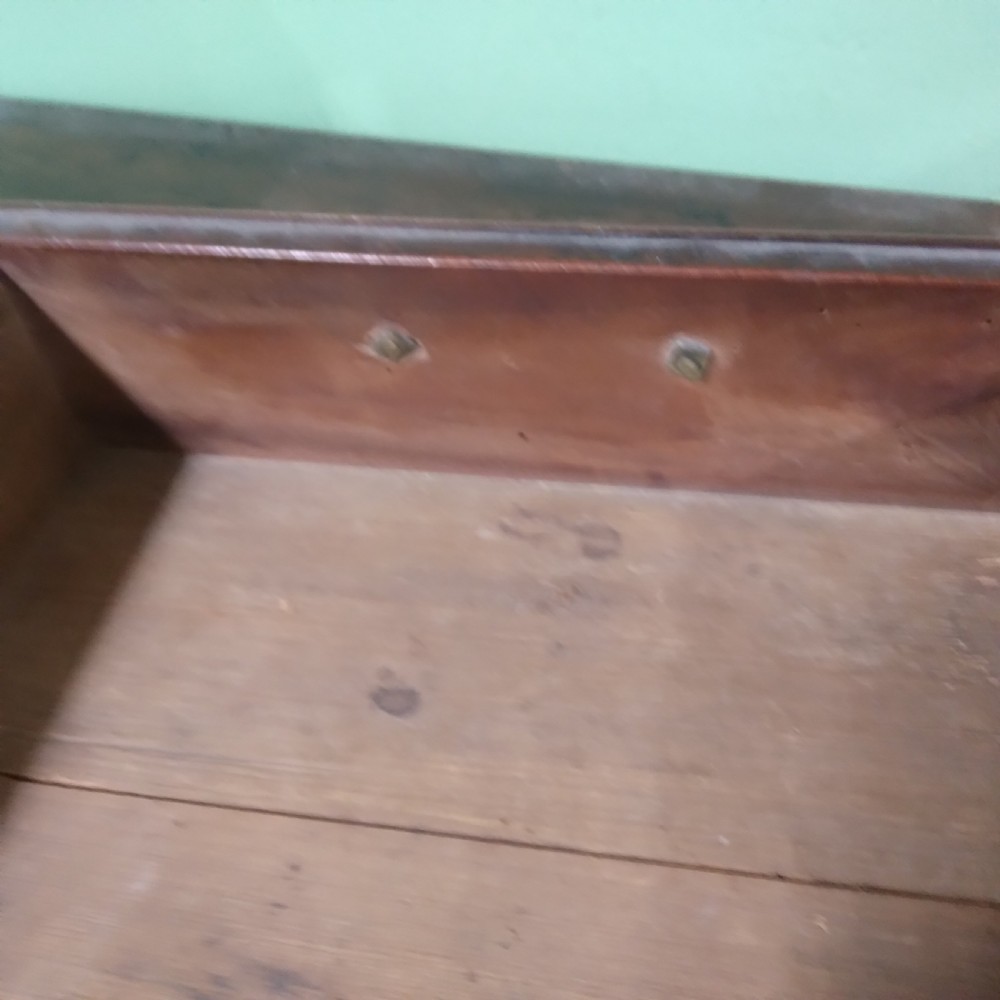 An antique fruitwood lowboy table featuring three drawers with brass drop handles, a shaped lower apron, and four square legs. View VIII