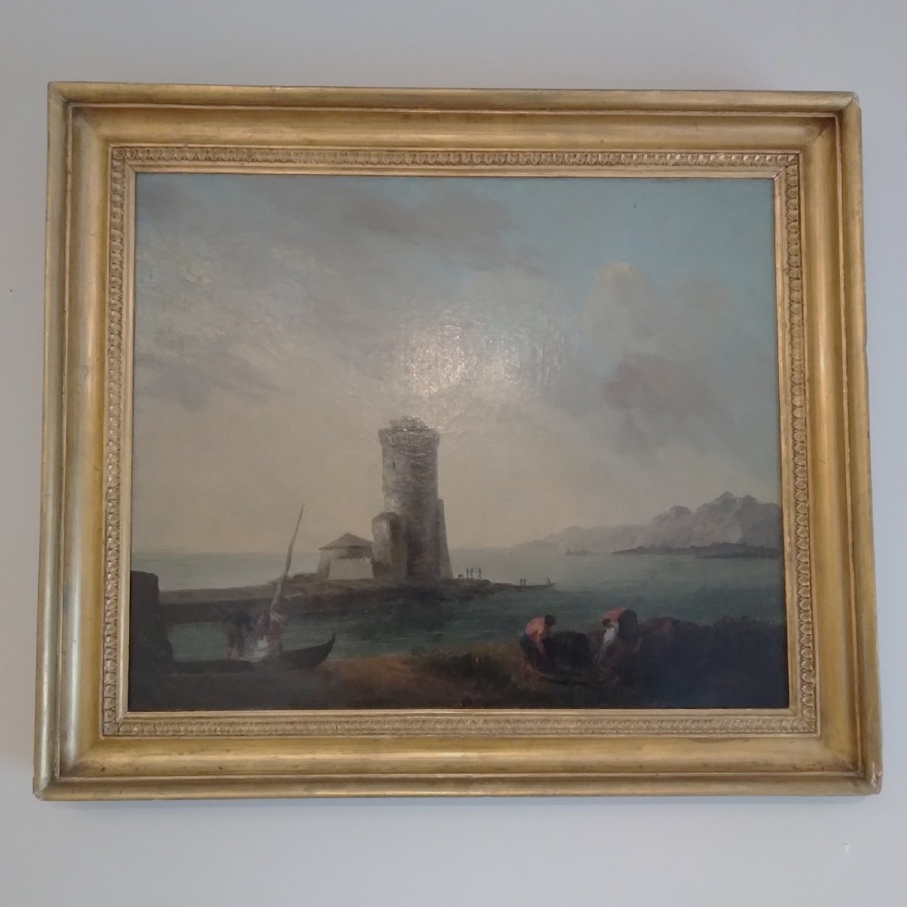 An 18th-century oil painting depicting a coastal seascape with a stone tower, figures, and small boats within a gilded wooden frame. View II