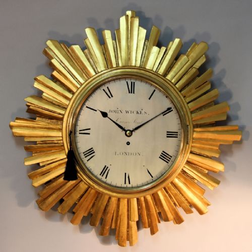 an extremely rare gilded 'sunburst' style english cartel fusee timepiece with original verge escapement - CATEGORY: ANTIQUE CLOCKS - DATED 18TH CENTURY