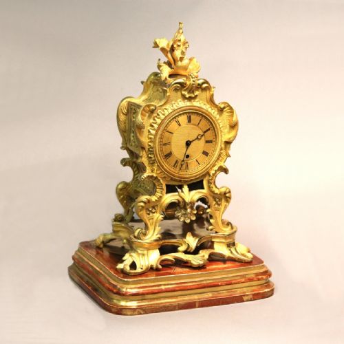 an english rococo style mantel clock with fusee movement and an ormolu case by john peterkin circa 1820 - CATEGORY: ANTIQUE CLOCKS - DATED 19TH CENTURY