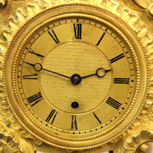 AN ENGLISH ROCOCO STYLE MANTEL CLOCK WITH FUSEE MOVEMENT AND AN ORMOLU CASE BY JOHN PETERKIN CIRCA 1820 - ADDITIONAL PHOTO 6