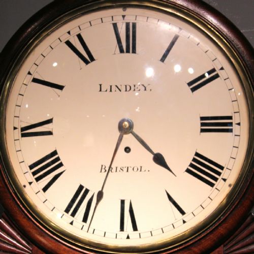 A LATE REGENCY ENGLISH DROPDIAL FUSEE WALL CLOCK IN A BRASS INLAID MAHOGANY CASE BOWED DIAL BY THOMAS LINDEY OF BRISTOL CIRCA 1830 - ADDITIONAL PHOTO 3