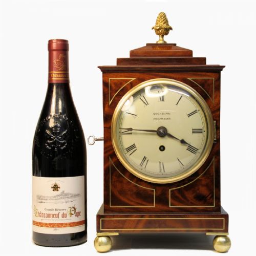A SMALL MAHOGANY LATE GEORGIAN CHAMFERTOP TABLE CLOCK WITH A FUSEE TIMEPIECE MOVEMENT CIRCA 1835 - ADDITIONAL PHOTO 9