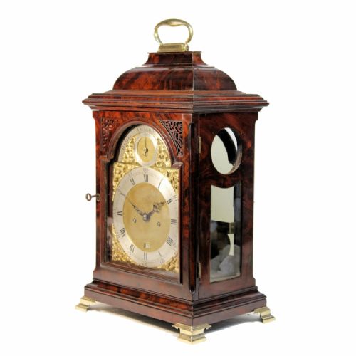 A FINE GEORGIAN BRACKET CLOCK IN A MAHOGANY CASE BY DANIEL VAUGUION OF LONDON CIRCA 1770 - ADDITIONAL PHOTO 1