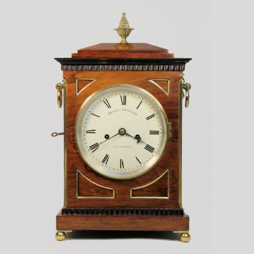a small chamfer top striking bracket clock in a rosewood case by henry archard london circa 1860 - CATEGORY: ANTIQUE CLOCKS - DATED 19TH CENTURY