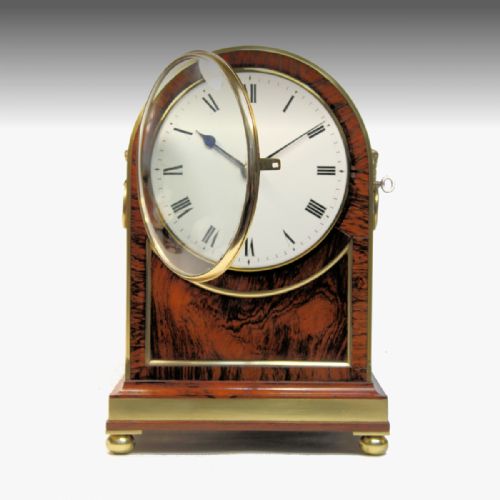 A GOOD TABLE CLOCK IN AN ARCHED ROSEWOOD AND BRASSBOUND CASE BY THOMAS GAMMAGE LONDON CIRCA 1835 - ADDITIONAL PHOTO 2
