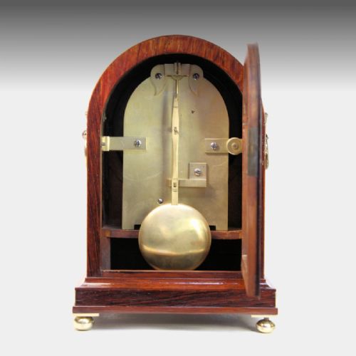 A GOOD TABLE CLOCK IN AN ARCHED ROSEWOOD AND BRASSBOUND CASE BY THOMAS GAMMAGE LONDON CIRCA 1835 - ADDITIONAL PHOTO 6
