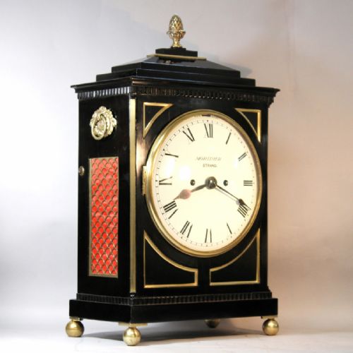 a regency period english chamfer top bracket clock in an ebonised case circa 1820 - CATEGORY: ANTIQUE CLOCKS - DATED 19TH CENTURY