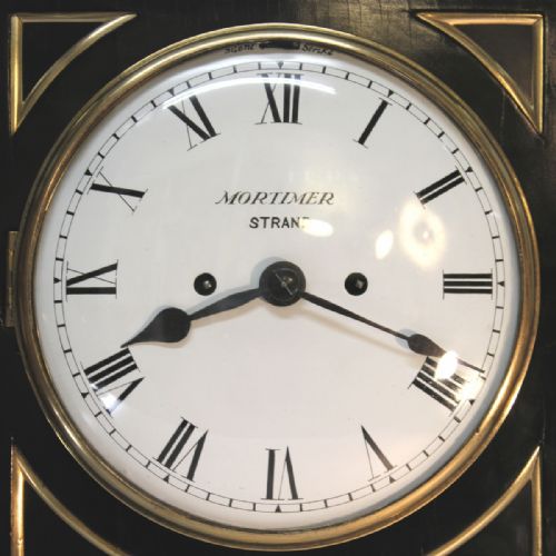 A REGENCY PERIOD ENGLISH CHAMFER TOP BRACKET CLOCK IN AN EBONISED CASE CIRCA 1820 - ADDITIONAL PHOTO 3